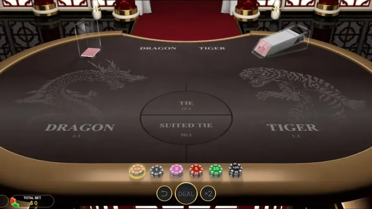 Live Sic Bo glass shaker dome containing three bouncing dice and intricate payout felt