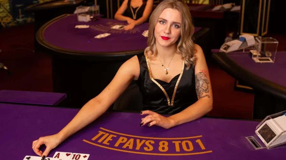 Sexy Gaming live dealer studio featuring themed Asian dealer presentation and interactive chat